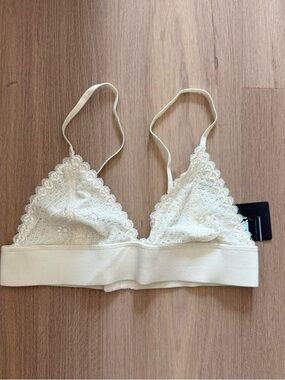 NWT size M urban outfitters pins and needles cream lace bralette